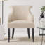 Fauteuil décoratif, garniture cloutée, bois de bouleau, tissu beige clair moelleux