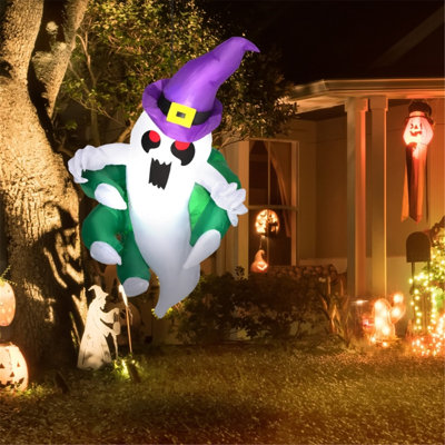 Décoration de fantôme de fenêtre gonflable d'Halloween 4 pi avec chapeau mauve et griffe verte, lumière DEL intégrée, ventouses et cordon pour la décoration intérieure / extérieure