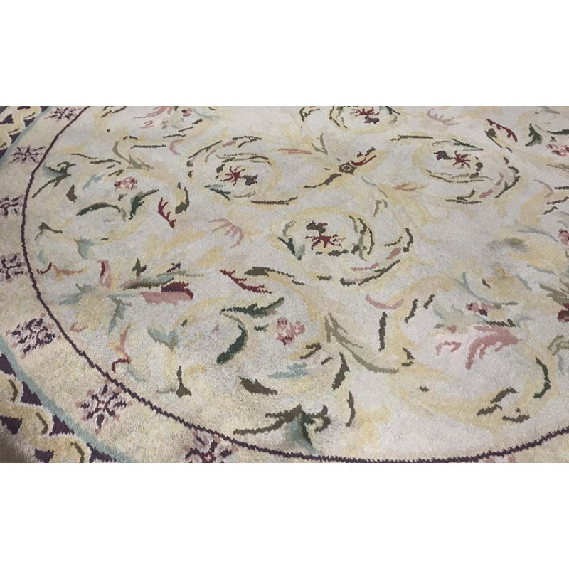 Tapis vert et ivoire noué à la main de haute qualité