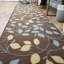 Tapis floral brun / bleu Arroya-22249185