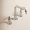 Kingston Brass Whitaker Two-Handle 3-Hole Deck Mount Widespread Bathroom Faucet with Push Pop-Up Drain