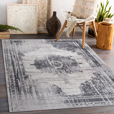 Dostal Area Rug