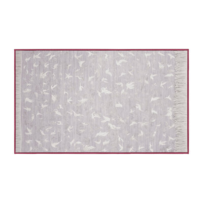 Tapis beige lavable à la machine