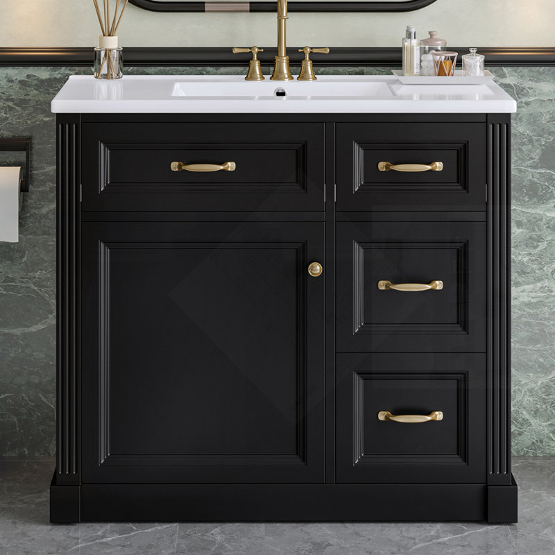 Meuble-lavabo moderne avec lavabo, 4 tiroirs, porte à fermeture en douceur, tablette réglable et lavabo en céramique pour un rangement efficace et un design élégant, finition noire