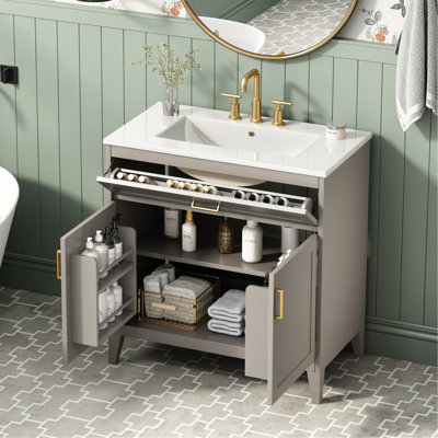 Meuble-lavabo de 76 cm avec lavabo en céramique, pieds en bois massif, portes doubles à fermeture amortie, tiroir basculant, tablette intérieure réglable, rangements intégrés aux portes, beige