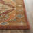 Ezell Hand Tufted Wool/Cotton/Latex Floral Rug in Rust-16768922