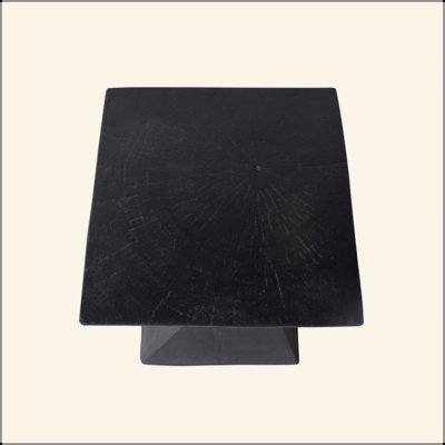 Charming Lightweight Concrete Side Table With Twisted Hourglass Structure