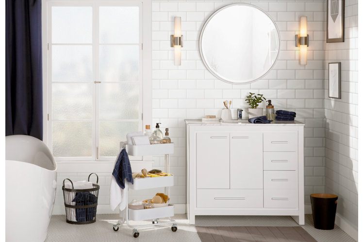 bathroom with white subway field tile walls