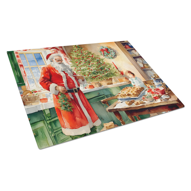 Planche à découper en forme de biscuits avec père Noël