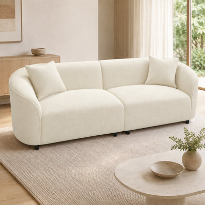 Canapé 3 places moderne incurvé de 221 cm de large, assise profonde rembourrée avec accoudoirs arrondis et 2 coussins décoratifs, canapé bas pour salon, vert