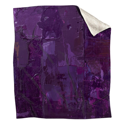 Couvertures mauves à motif abstrait texturé