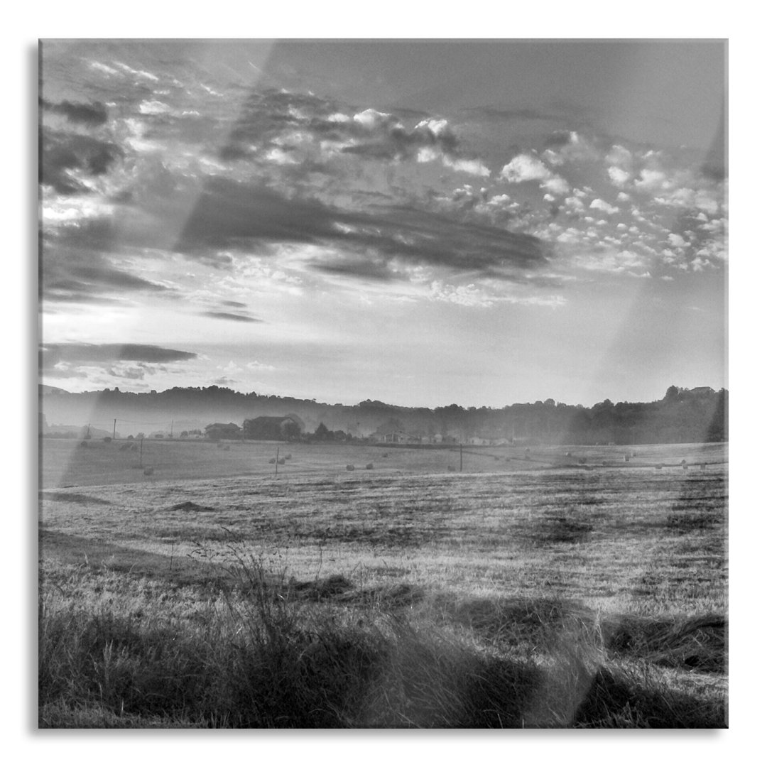 Glasbild Feld mit Heuballen