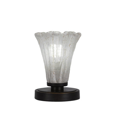 Lampe d'appoint Aneka montrée avec verre
