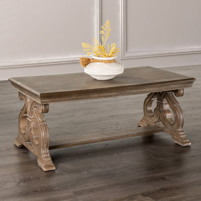 A Traditional Coffee Table With Details, Scroll Legs, Medium - Sized Top, Weathered Oak Finish, 20 Inches Tall Solid Wood And Veneer Look, 28 Width