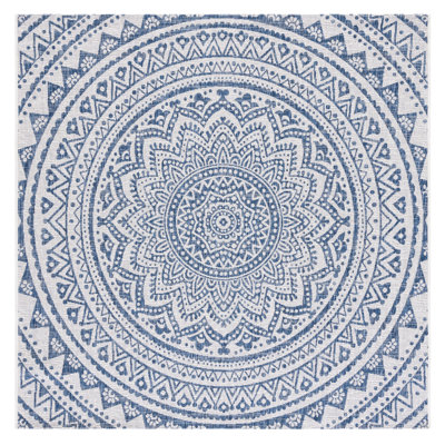 Tapis intérieur / extérieur ivoire / bleu marine Ellefson