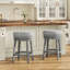 Tabouret de bar rembourré pivotant avec structure en bois massif et garniture cloutée-2042681860-2042681857
