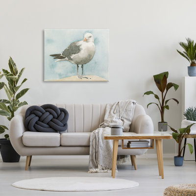 Mouette douce sur fond bleu beige