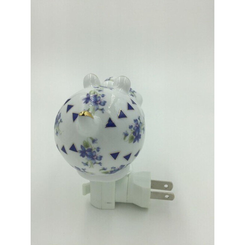 Veilleuse florale en forme d'hippopotame