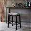 Élégant tabouret de comptoir de style selle avec un design ergonomique et des détails cloutés en cuivre, pour les cuisines modernes et traditionnelles.-2018993419-2018993420-2018993422