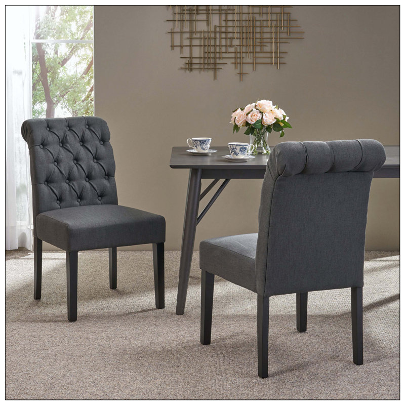 Ensemble de chaises de salle à manger touffetées à roulettes, idéal pour une utilisation quotidienne dans la salle à manger