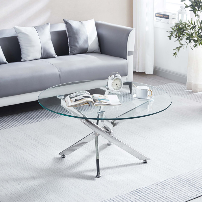 Table basse avec pieds en acier inoxydable, ronde