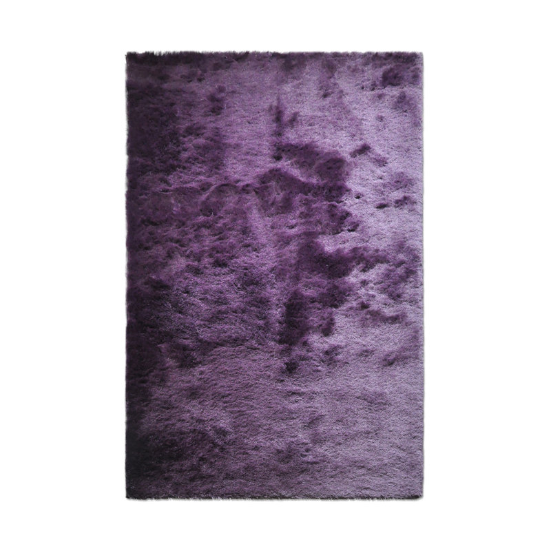 Tapis mauve touffeté à la main