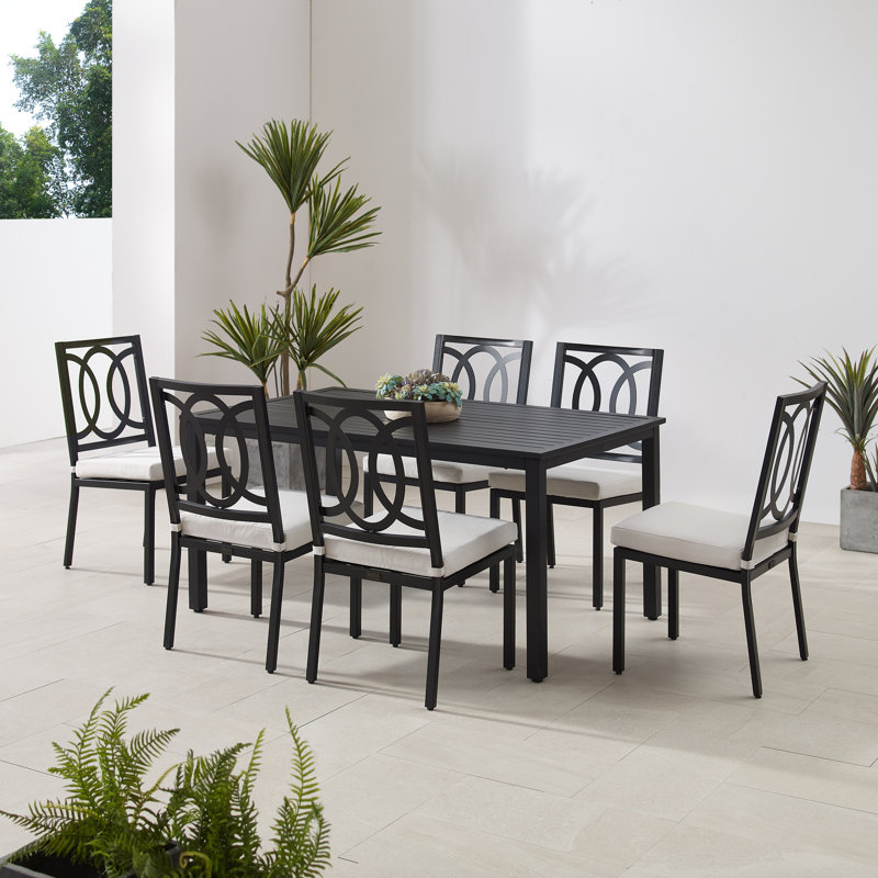 Creddy 6 - Person Patio Dining Set with Rectangular Table , Cushions Included