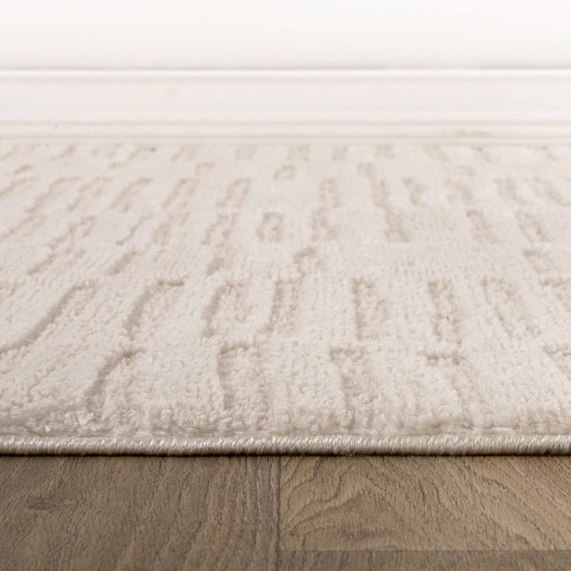 Tapis d'intérieur à poils longs et doux, tissé à la machine, blanc perle, à texture horizontale et à chevrons., Blanc