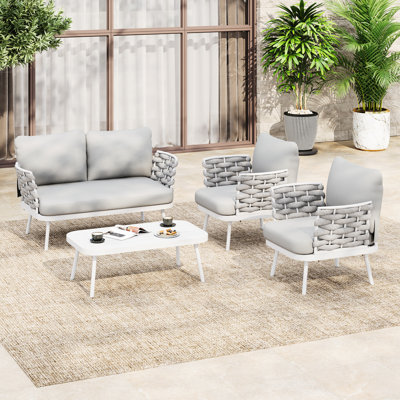 Ensemble de conversation de patio 4 pièces gris et blanc, coussins en mousse haute densité pour un confort optimal, structure en corde tressée à la main pour un style raffiné, housses de coussins faciles à nettoyer, ton sur ton, ergonomique