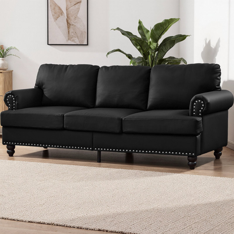 Canapé 83 places moderne en similicuir de 83 po avec garniture cloutée argentée, siège à ressorts, coussins amovibles et rangement dissimulé, pieds en bois massif brun foncé