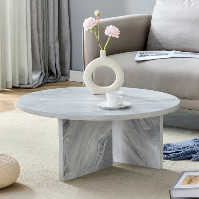 Une table basse ronde multi-style en panneau de fibres à densité moyenne, avec un minimalisme moderne et une touche nordique