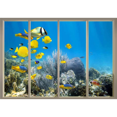 Fish Swimming Over The Coral Reefs