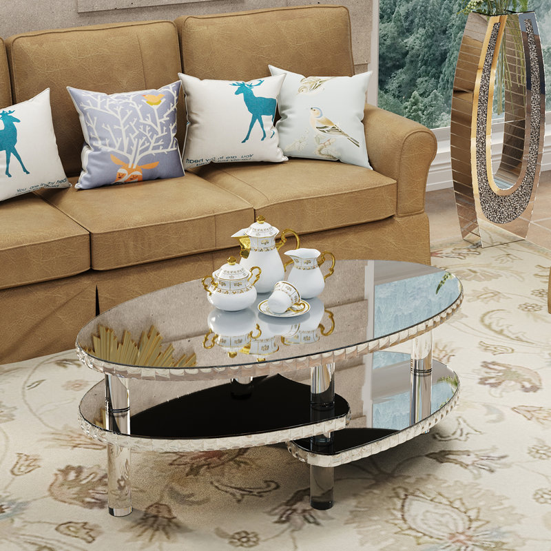 Table basse ovale moderne à miroir 2 niveaux 43,3 po avec pieds en acrylique et bordure en cristal Modern Glam