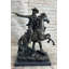 Statue de bronze d'un cowboy de l'Ouest
