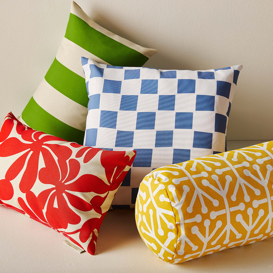 Coussins géo et fleurs variés.
