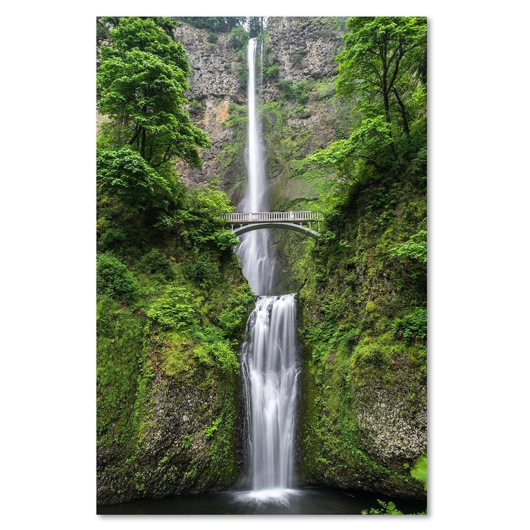 Leinwandbild Brücke über einen Wasserfall