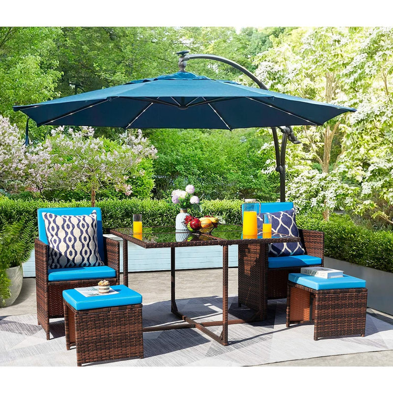 Fransje 4 - Person Wicker Patio Dining Set with Rectangular Table, Blue