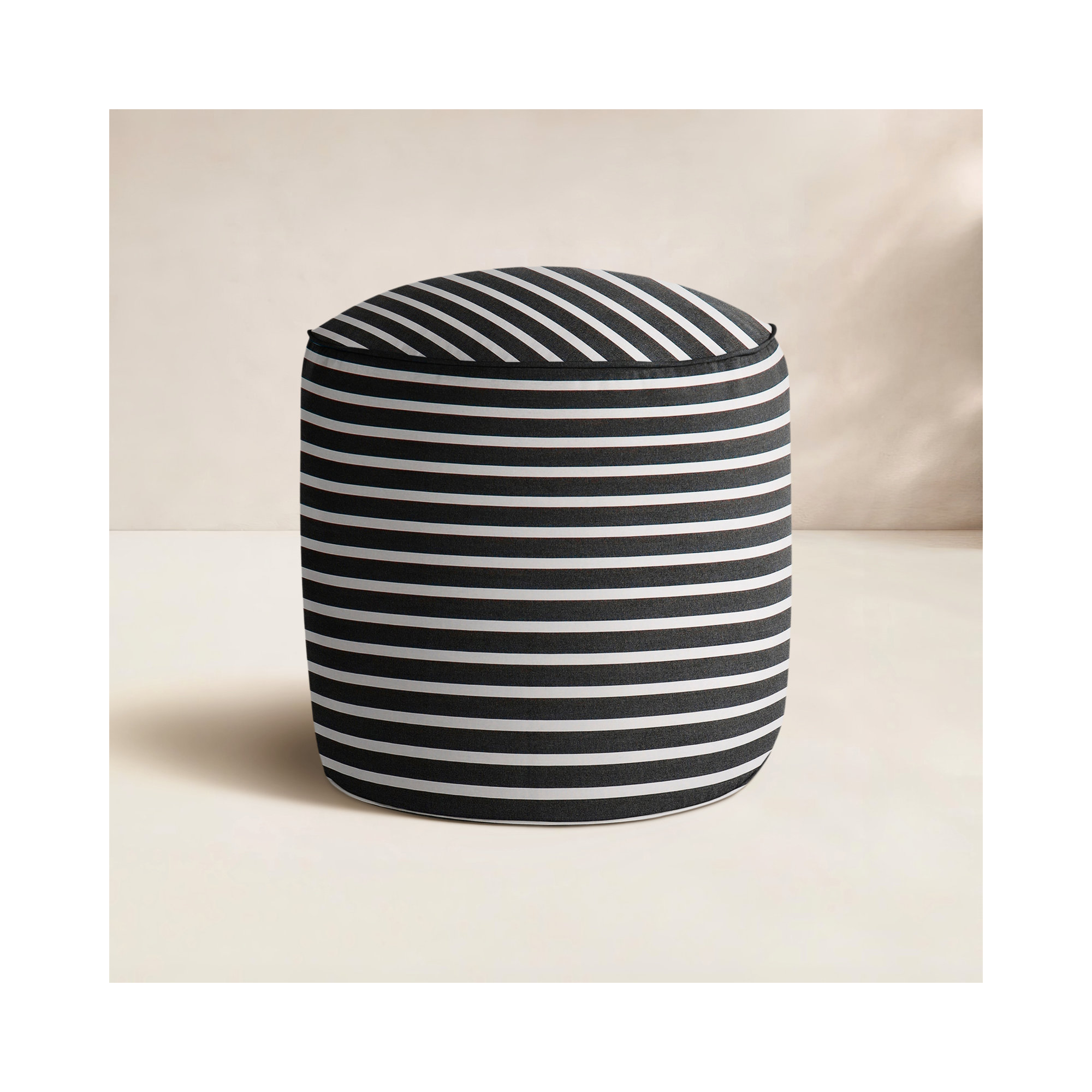 Moseley Round Upholstered Outdoor Ottoman with Sunbrella® Cushion, Shore Classic Black Stripe Sunbrella®