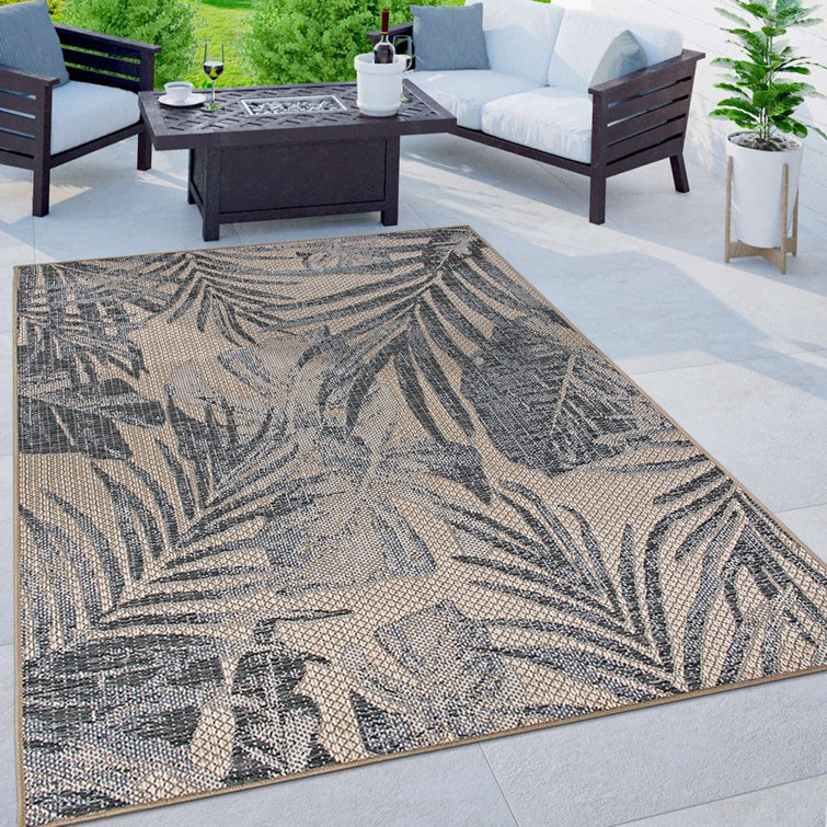 https://assets.wfcdn.com/im/96800790/resize-h755-w755%5Ecompr-r85/2110/211087152/Zahir+Tropical+Floral+Indoor%2FOutdoor+Area+Rug+Cream%2FGray%2FBlack.jpg