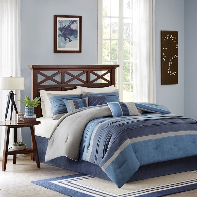 Édredon en microsuède bleu marine avec détails plissés et intérieur lavable