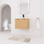 Meuble-lavabo mural 24 po avec lavabo en résine blanche, portes à fermeture en douceur