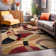 Mehul Geometric Multi Coloured Area Rug in Red/Brown/Black