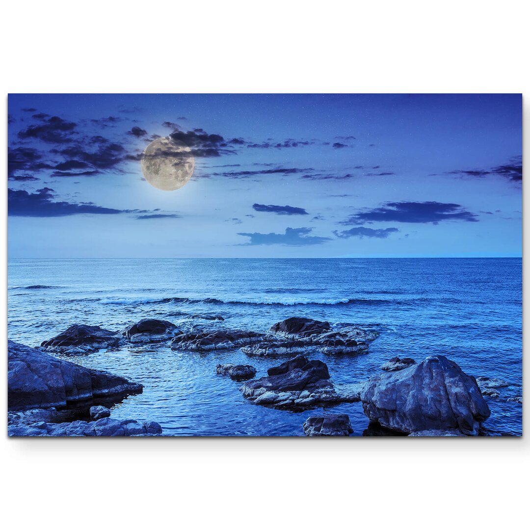 Leinwandbild Steiniger Strand bei Nacht