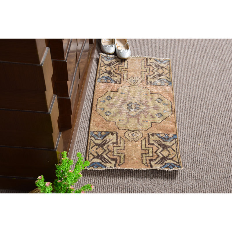 Vintage Hand-Knotted Turkish Rug in Natural Wool with Geometric Patterns and Brown & Blue Tones