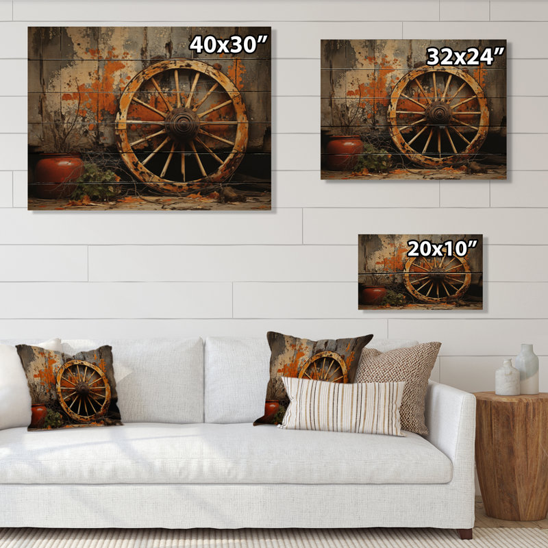 Vieille roue de chariot orange I sur bois, H 30 po x l 40 po x P 0,78 po