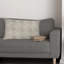 Coussin à fermeture à glissière en coton beige et ivoire avec broderies et pompons 16 po x 24 po