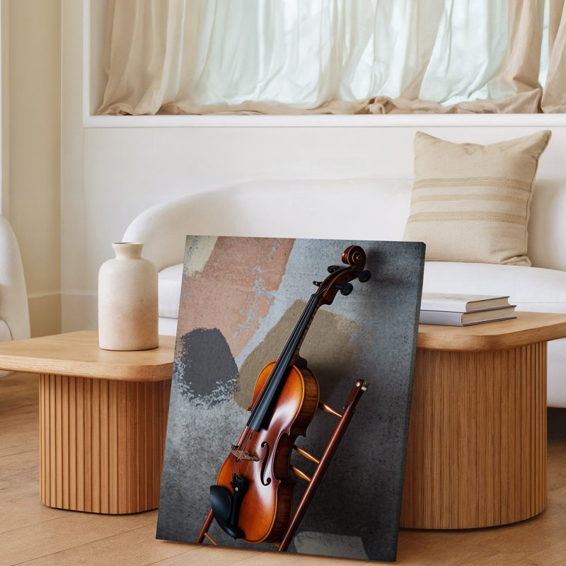 Reproduction d'art sur toile, un magnifique violon suspendu contre un mur de béton texturé en sourdine mettant en valeur ses riches tons chauds d'acajou et toile