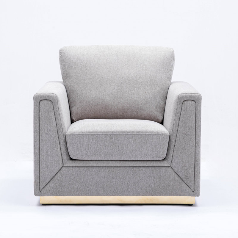 Chaise d'appoint grise avec coussin