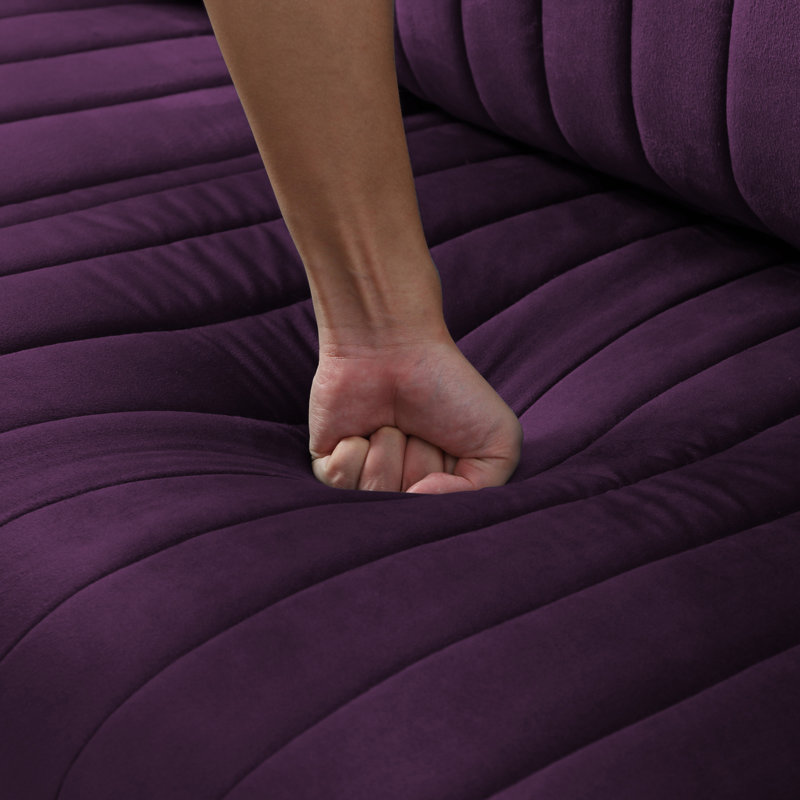 Repose-pieds luxueux en velours pour un salon élégant avec une fonctionnalité polyvalente