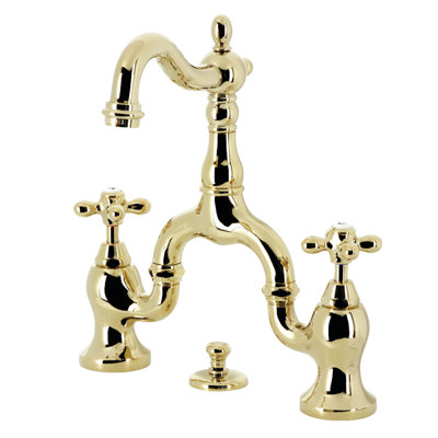 Kingston Brass English Country Two-Handle 3-Hole Deck Mount Bridge Bathroom Faucet with Brass Pop-Up
